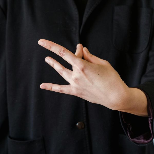 Detail shot of hands in a mudra position